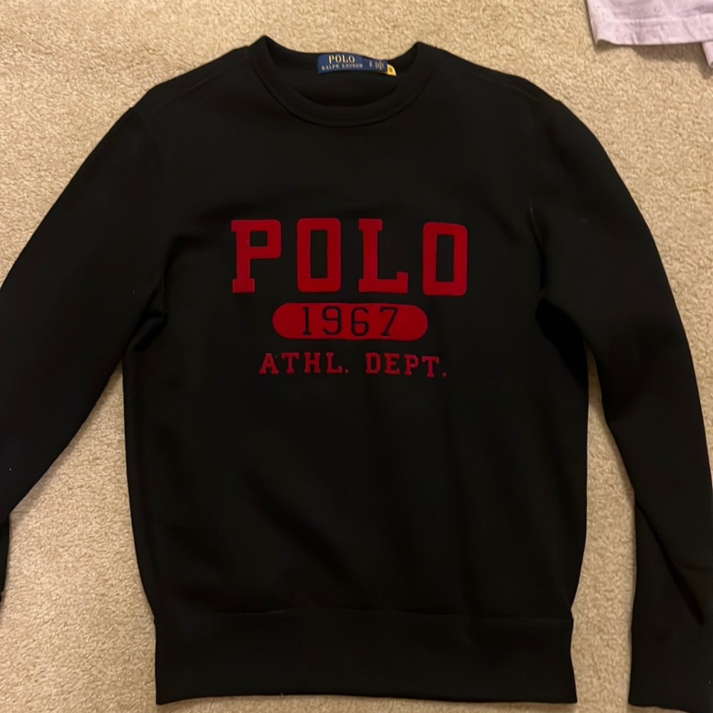 Polo sweatshirt. Black with red writing.  size small
